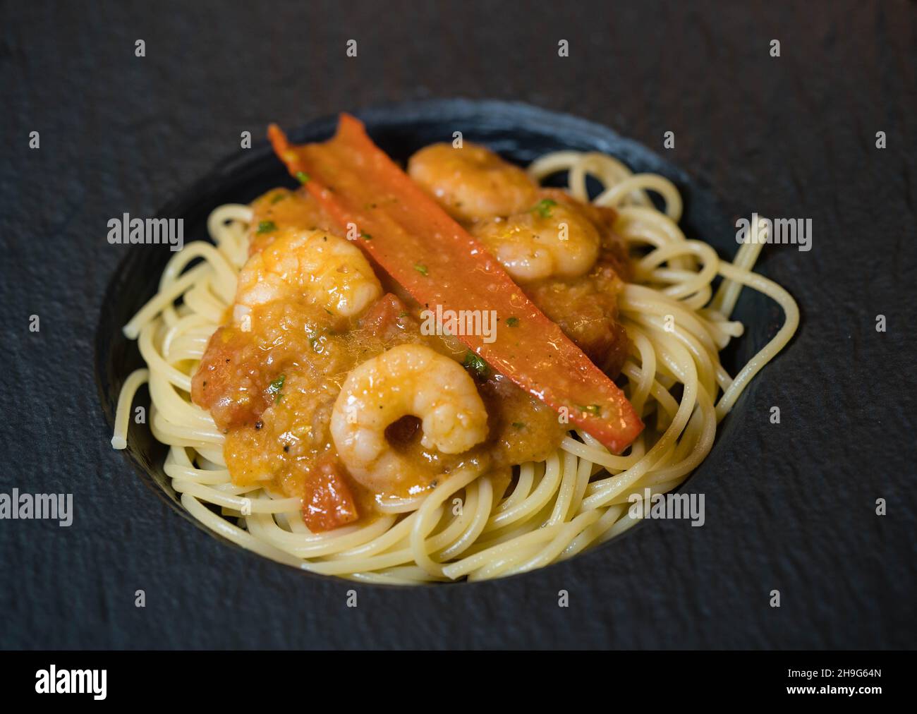 Spaghetti alla busara pasta with shrimps an Italien specialty Stock