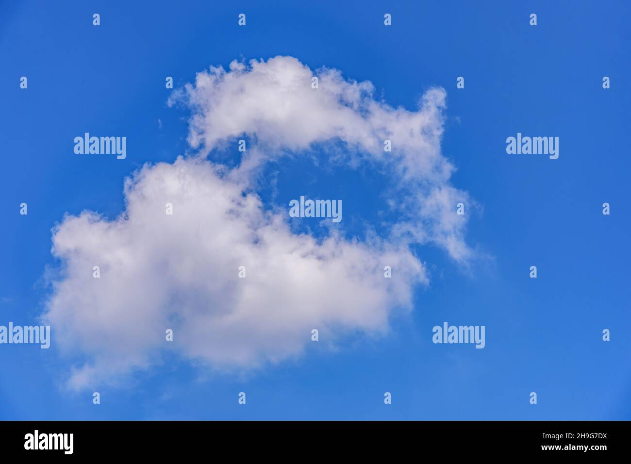 White clouds against blue sky for a background Stock Photo - Alamy