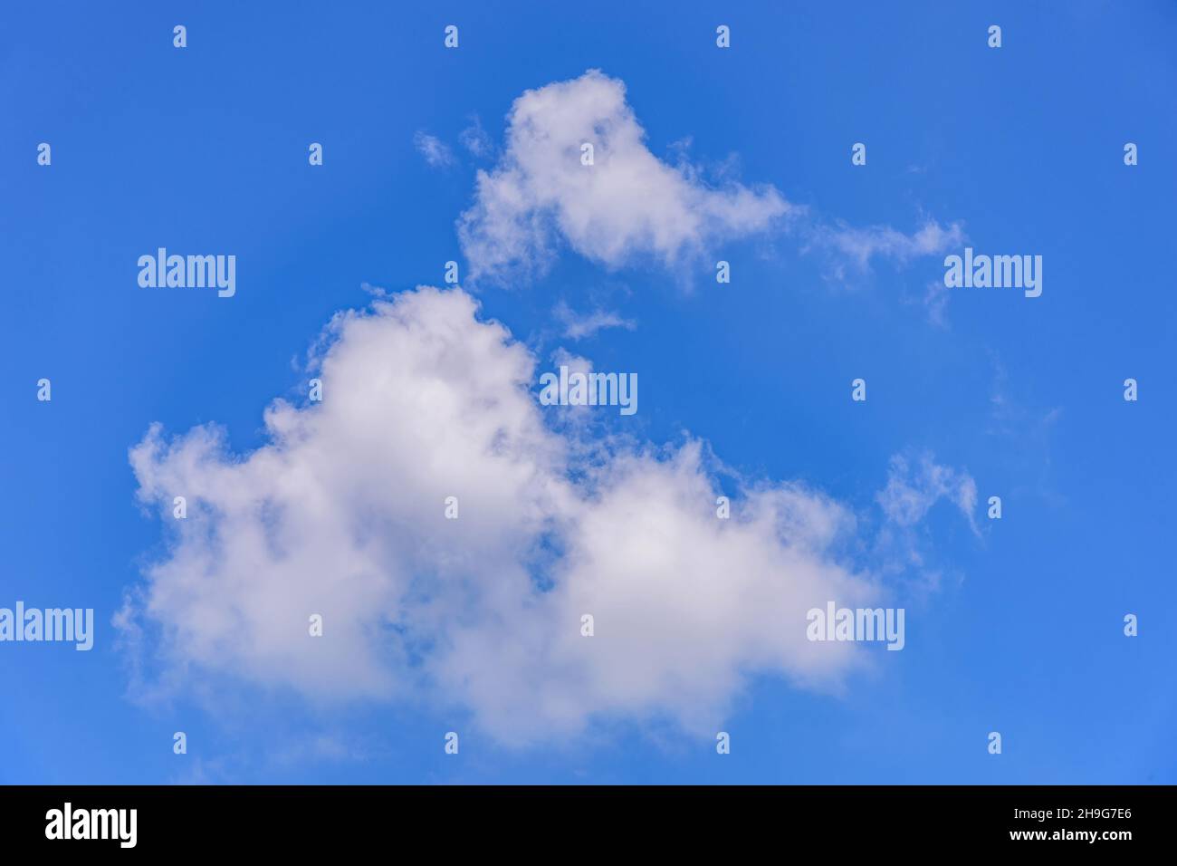 White clouds against blue sky for a background Stock Photo - Alamy