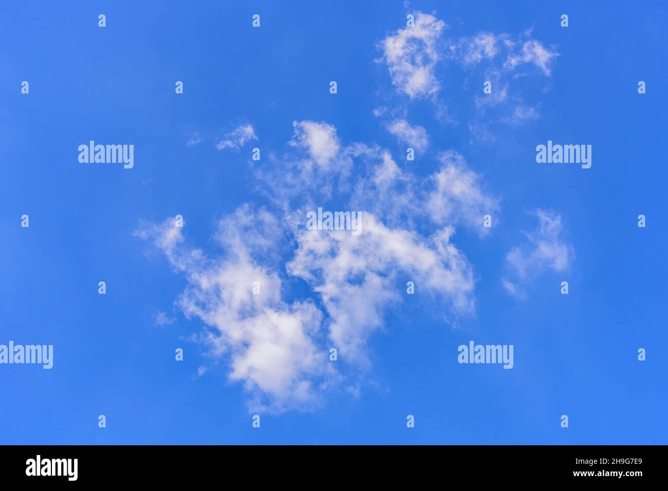 White clouds against blue sky for a background Stock Photo - Alamy