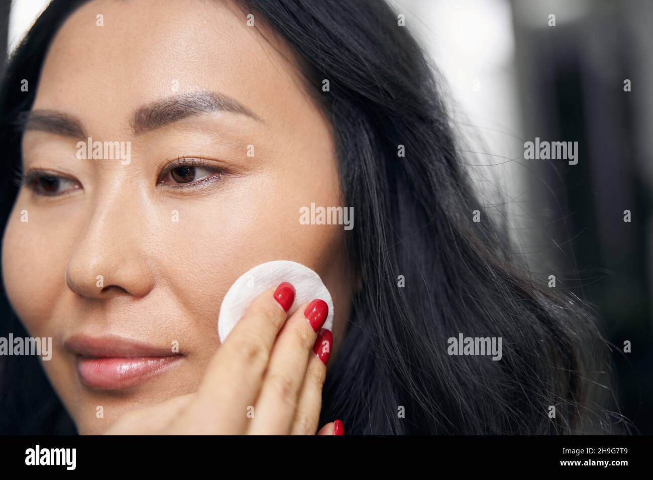 Taking off makeup hi-res stock photography and images - Alamy