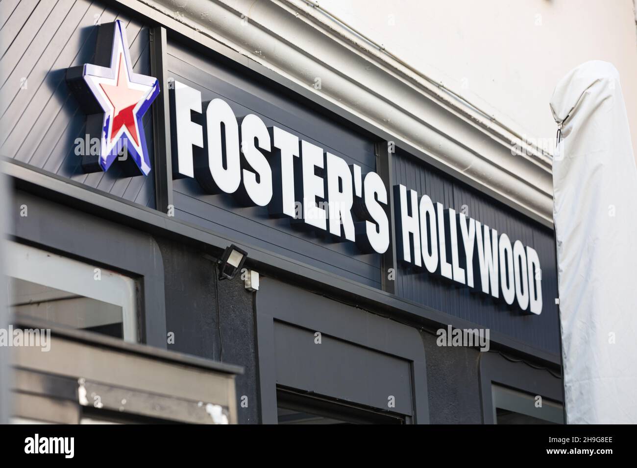 Madrid, Spain - December 06, 2021: Foster Hollywood restaurant exterior sign. Stock Photo
