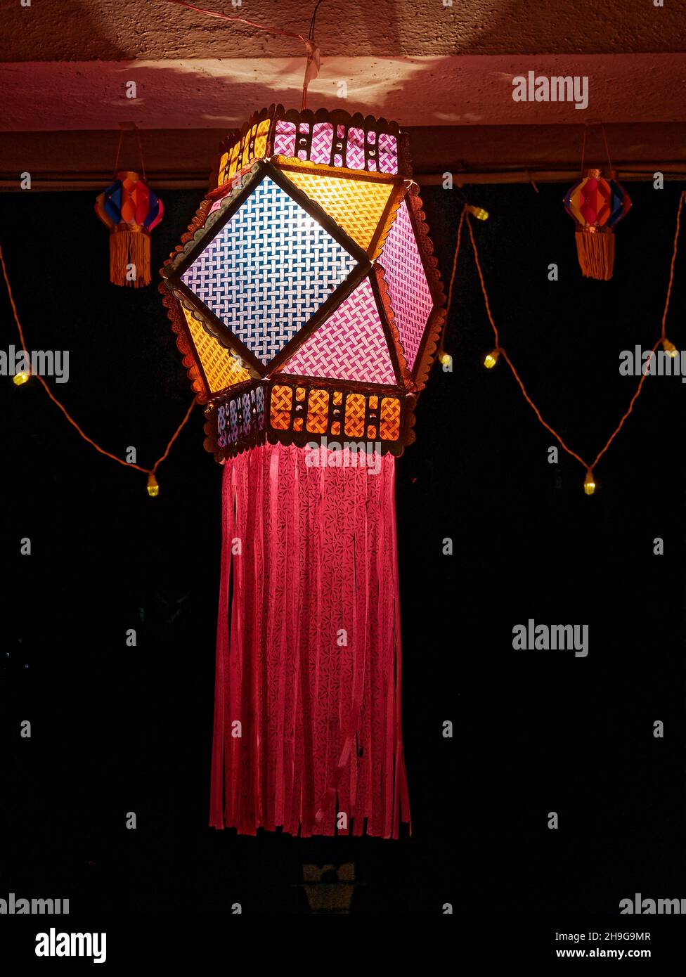 Colorful modern lantern Akash Kandil decorative lampa hang out at house balcony for celebrating Diwali Festival Stock Photo