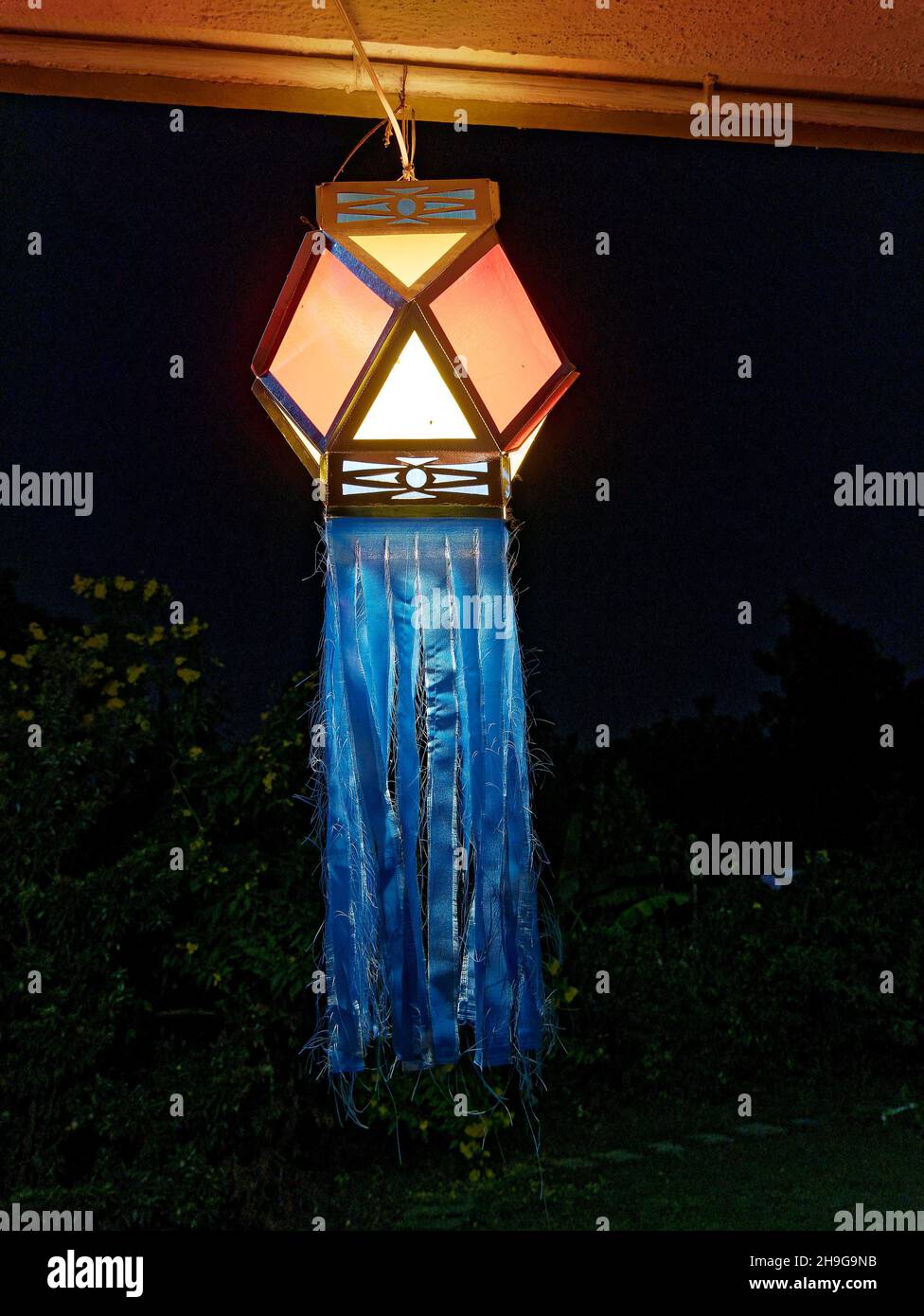 Colorful modern lantern Akash Kandil decorative lampa hang out at house balcony for celebrating Diwali Festival Stock Photo