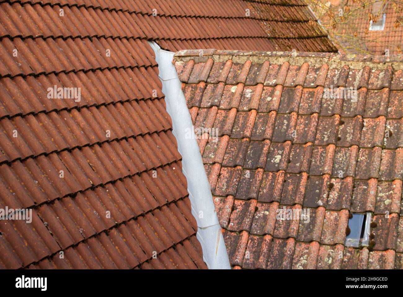 Close-up shot of a roof covered with red tiles during the day Stock Photo