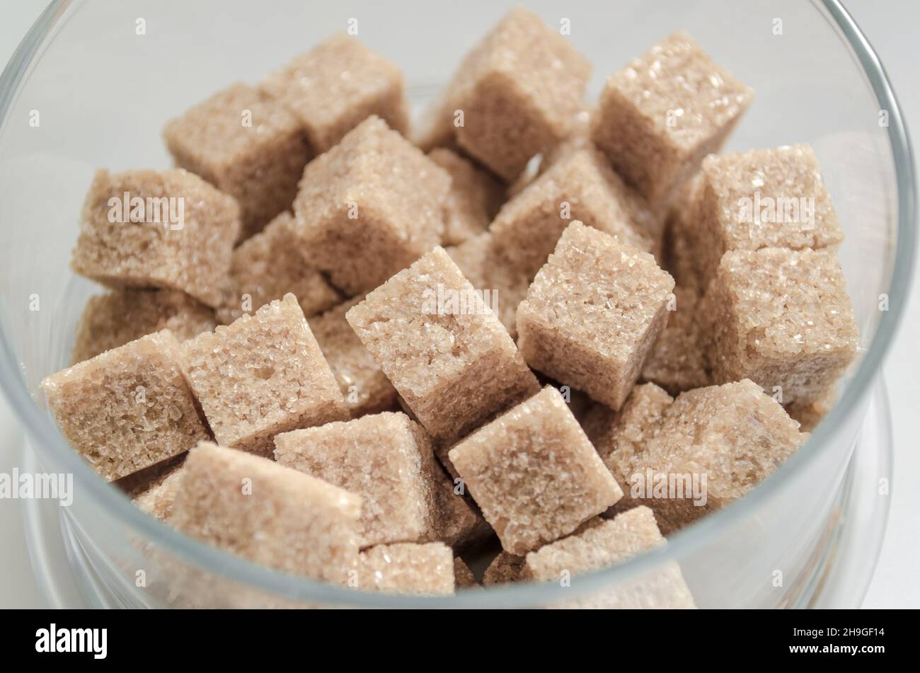 cane sugar cubes isolated Stock Photo Alamy