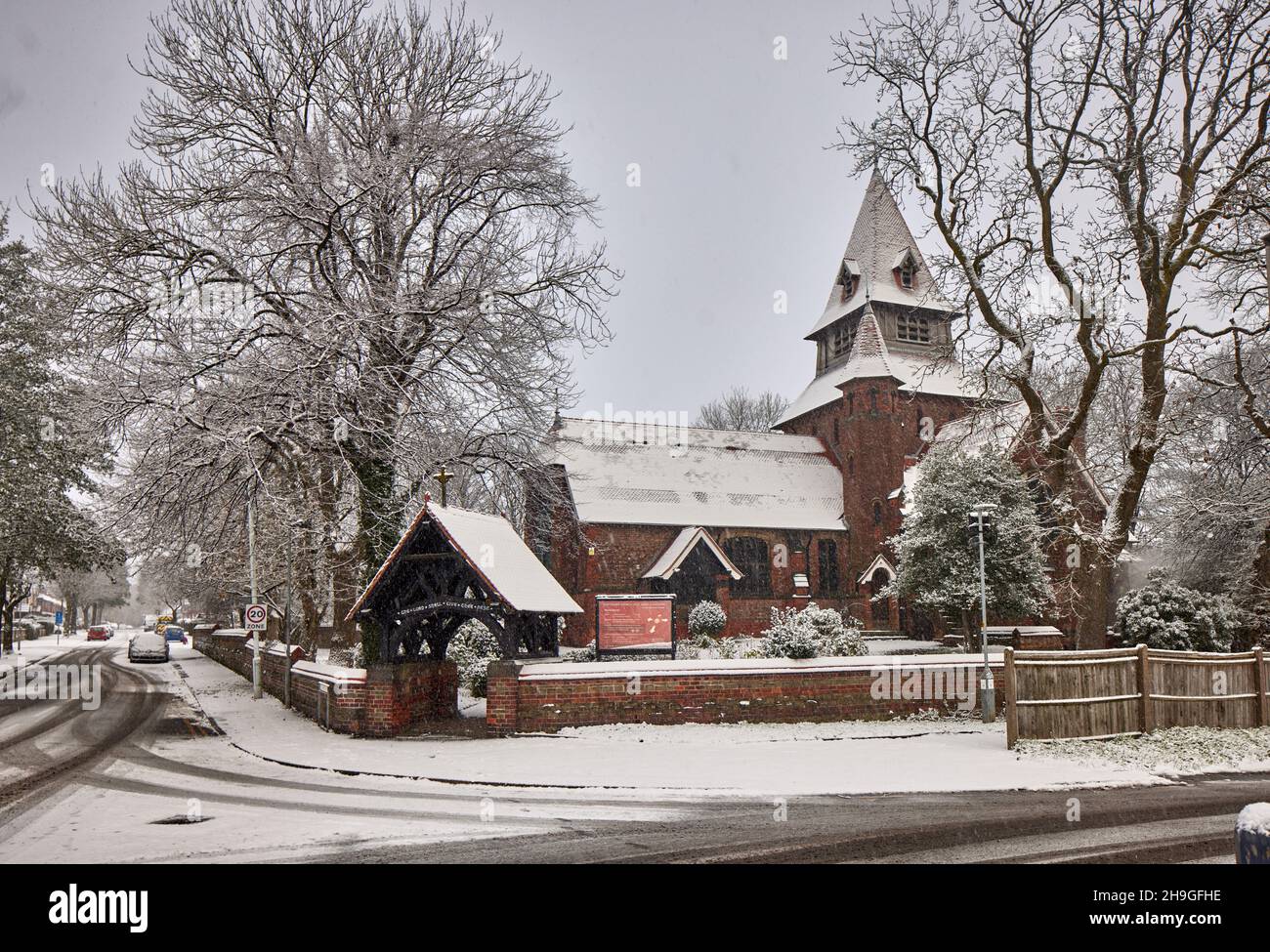 Winter Snow at Denton, Tameside. Grade 1 listed Gothic Revival style,  St Anne's Church Haughton designed by J. Medland Taylor Stock Photo