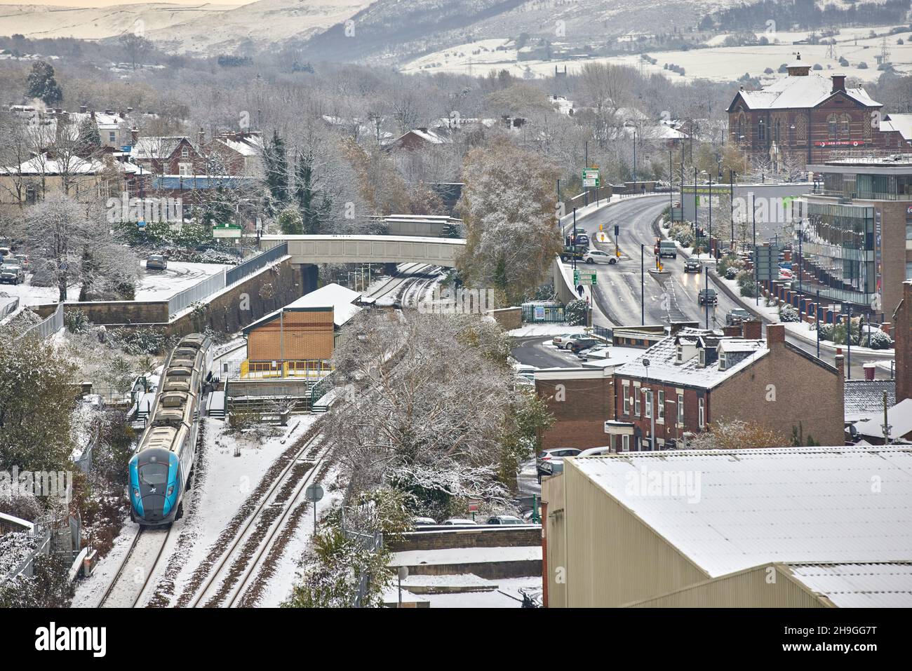 Tameside Winter Snow, AshtonunderLyne,, Greater Manchester, England. TPE train at the towns