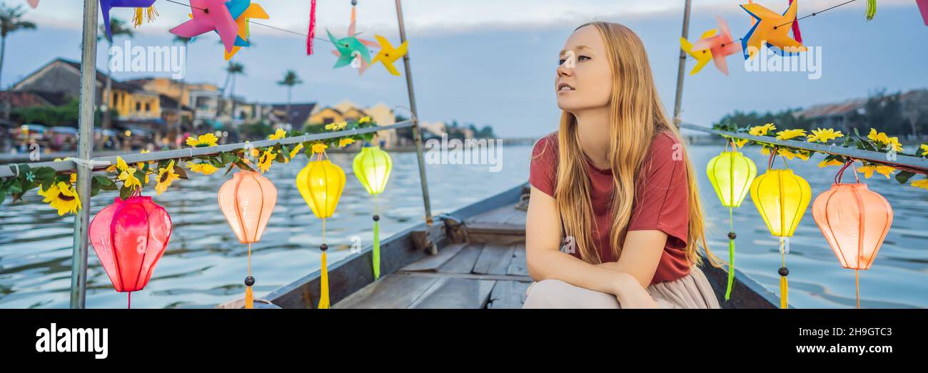 BANNER, LONG FORMAT Happy woman traveler ride a national boat on ...