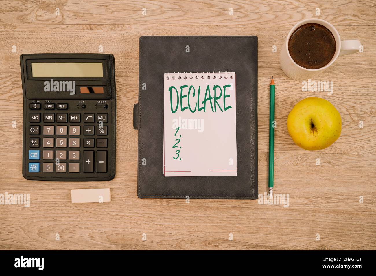 Text sign showing Declare. Word for make known or state clearly especially  in explicit or formal terms Blank Notebook Page With A Calculator And Stock  Photo - Alamy