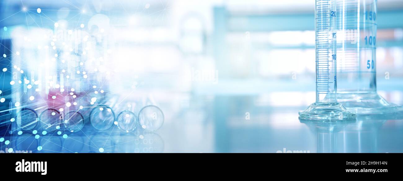 glass cylinder and test tube science equipment in blue information