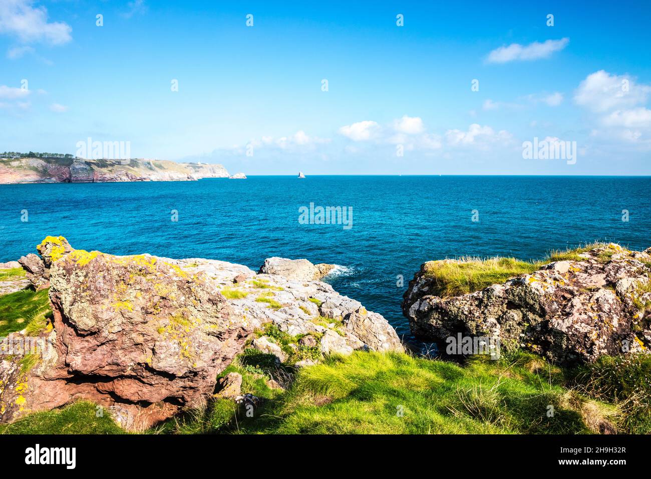 View towards St. Mary's Bay, Darl Head and Berry Head near Brixham in Devon from the South West Coast Path Stock Photo