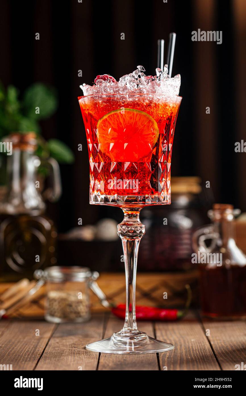 Sweet red berry alcohol cocktail in a fancy glass Stock Photo