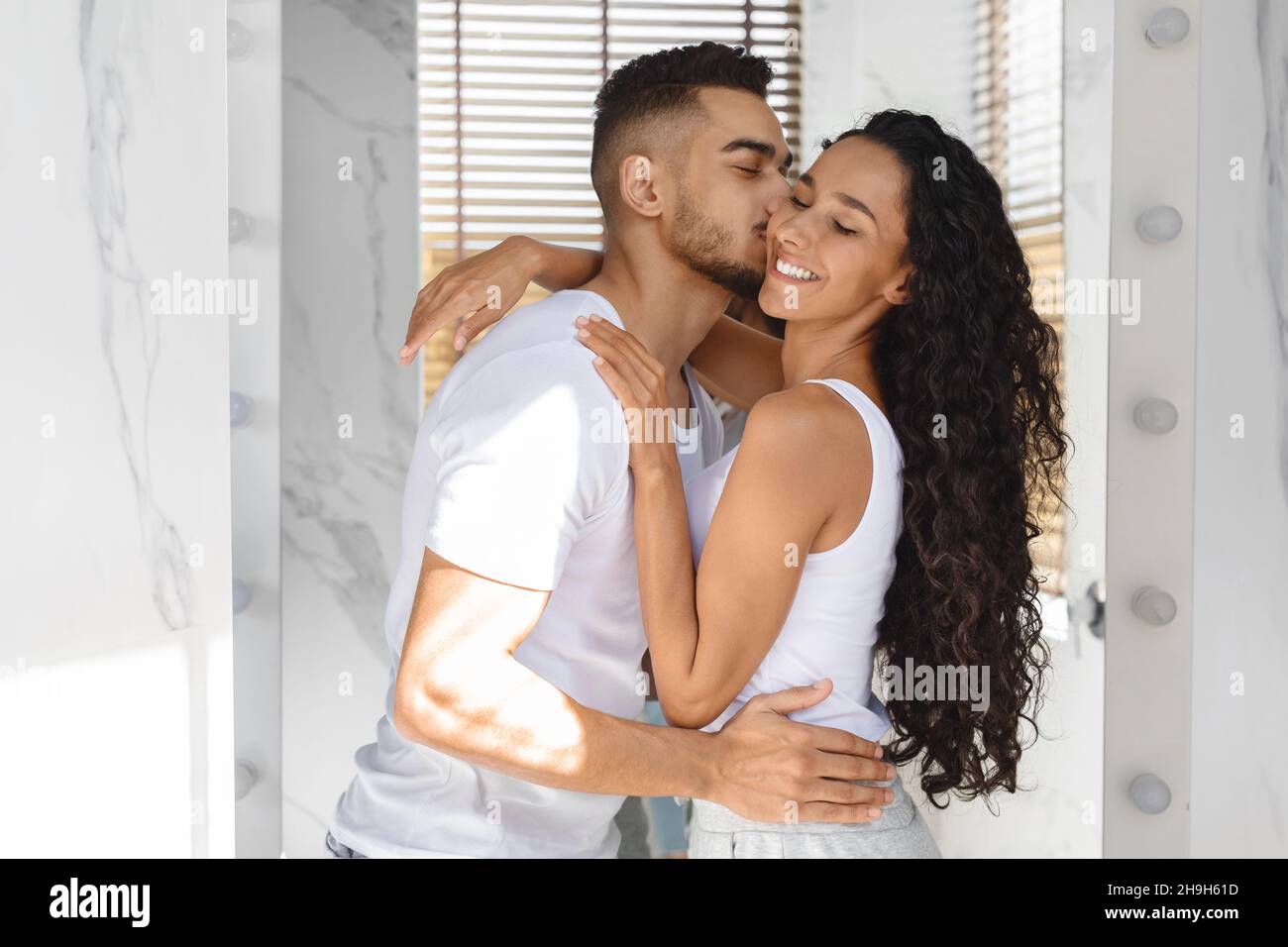 Couple kissing in bathroom hi-res stock photography and images - Alamy
