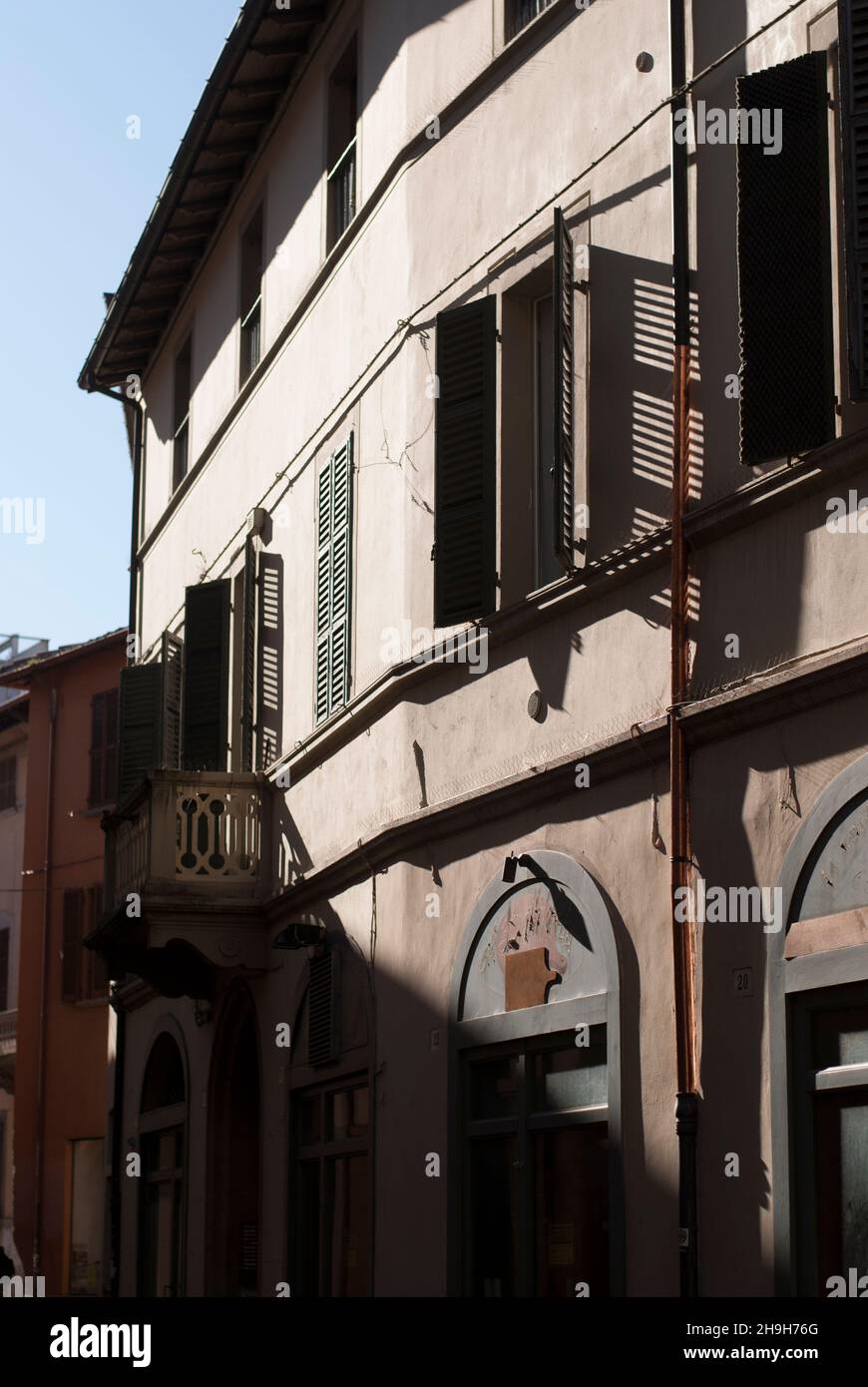 View on windows of street building Stock Photo - Alamy