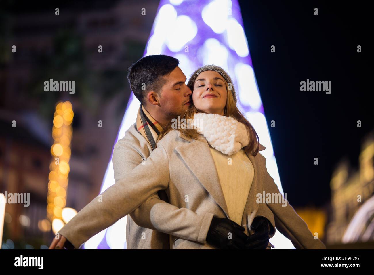 Romantic teenage couple tree in hi-res stock photography and images - Alamy