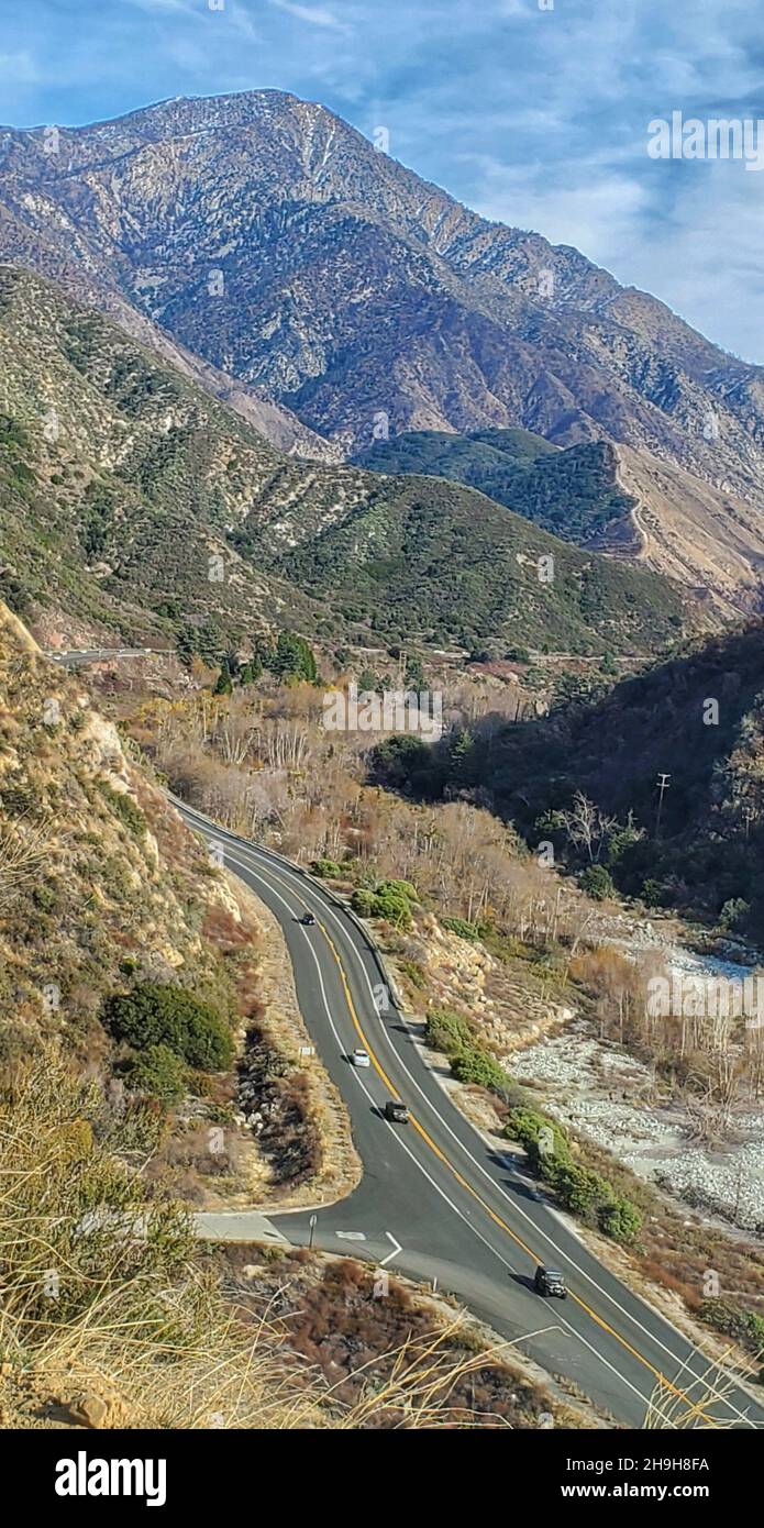 Vertical view of a highway in the Angelus Oaks, California Stock Photo