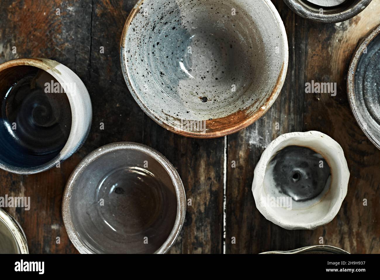 Ceramic tableware on wooden background, top view Stock Photo