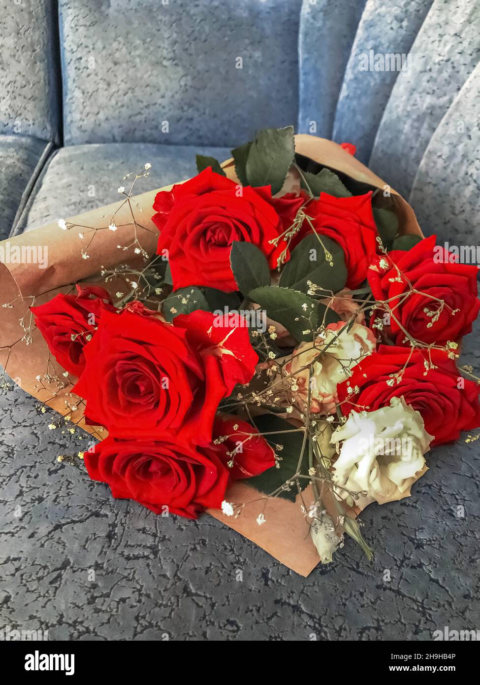 Bouquet red roses wrapped hi-res stock photography and images - Alamy