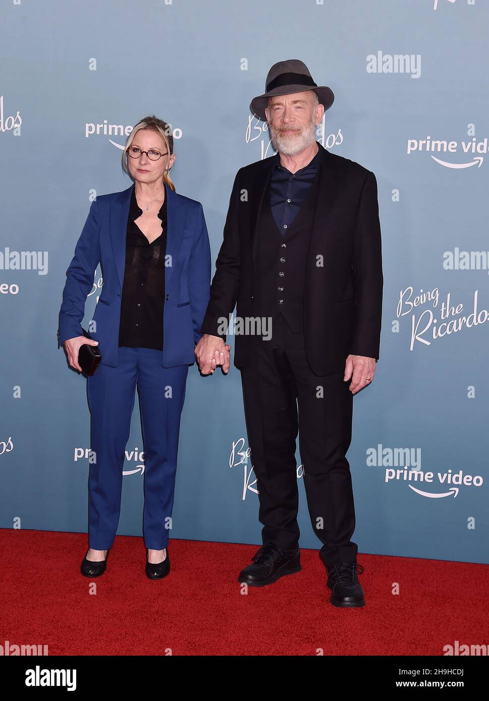 LOS ANGELES, CA - DECEMBER 06: (L-R) Michelle Schumacher and J.K. Simmons  attends the Los Angeles Premiere Of Amazon Studios' "Being The Ricardos" at  Academy Museum of Motion Pictures on December 06,