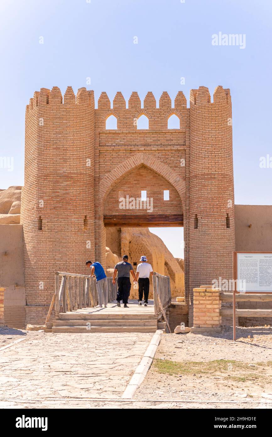 Tourists crossing the bridge to the gates of the ancient city of Sawran or Sauran, Silk Way, 12-16 cc, Kazakhstan, Central Asia Stock Photo
