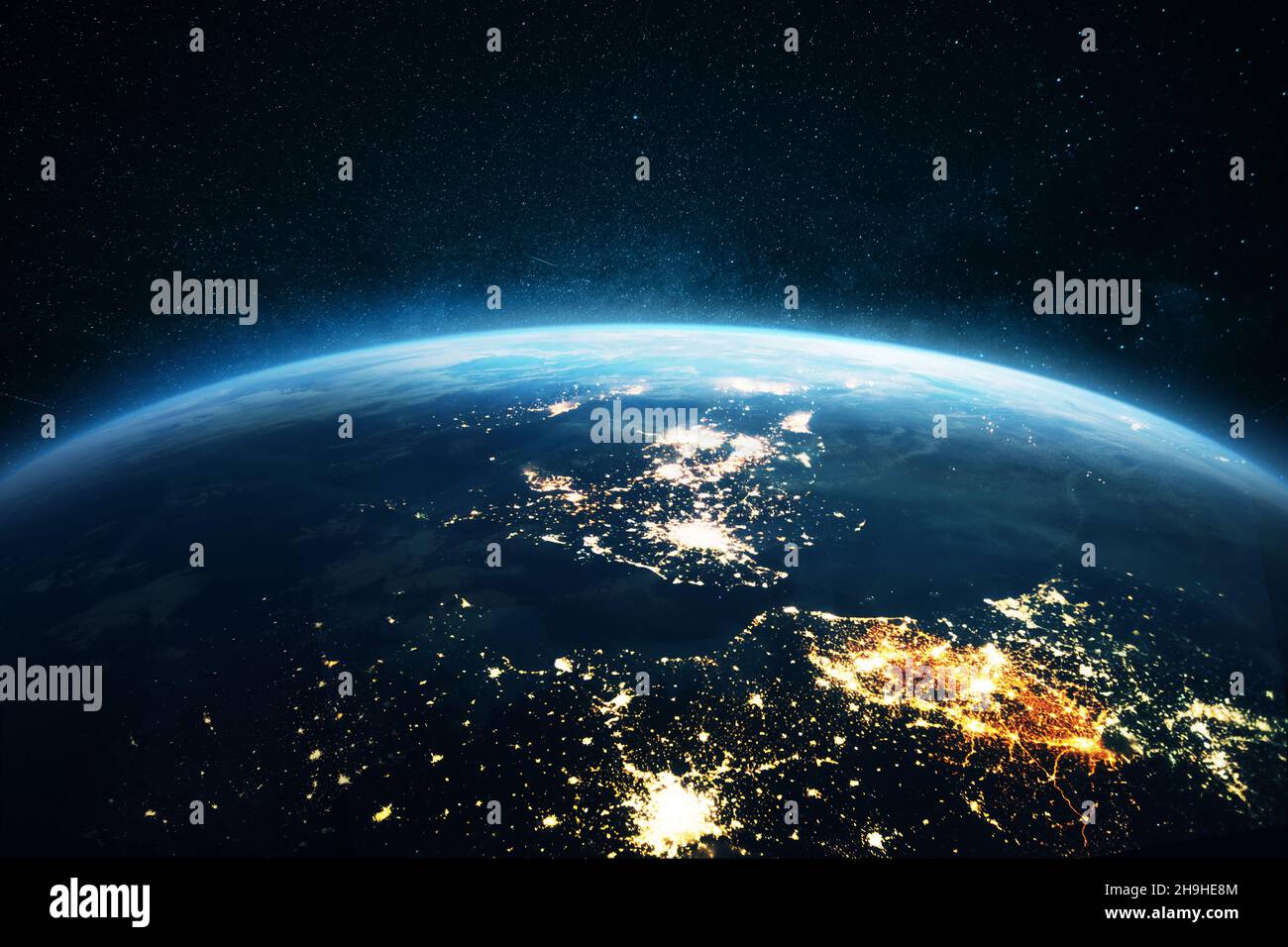 Amazing blue planet earth with night city lights on the starry sky in space. Great Britain, London view from space. Electricity and power supply conce Stock Photo