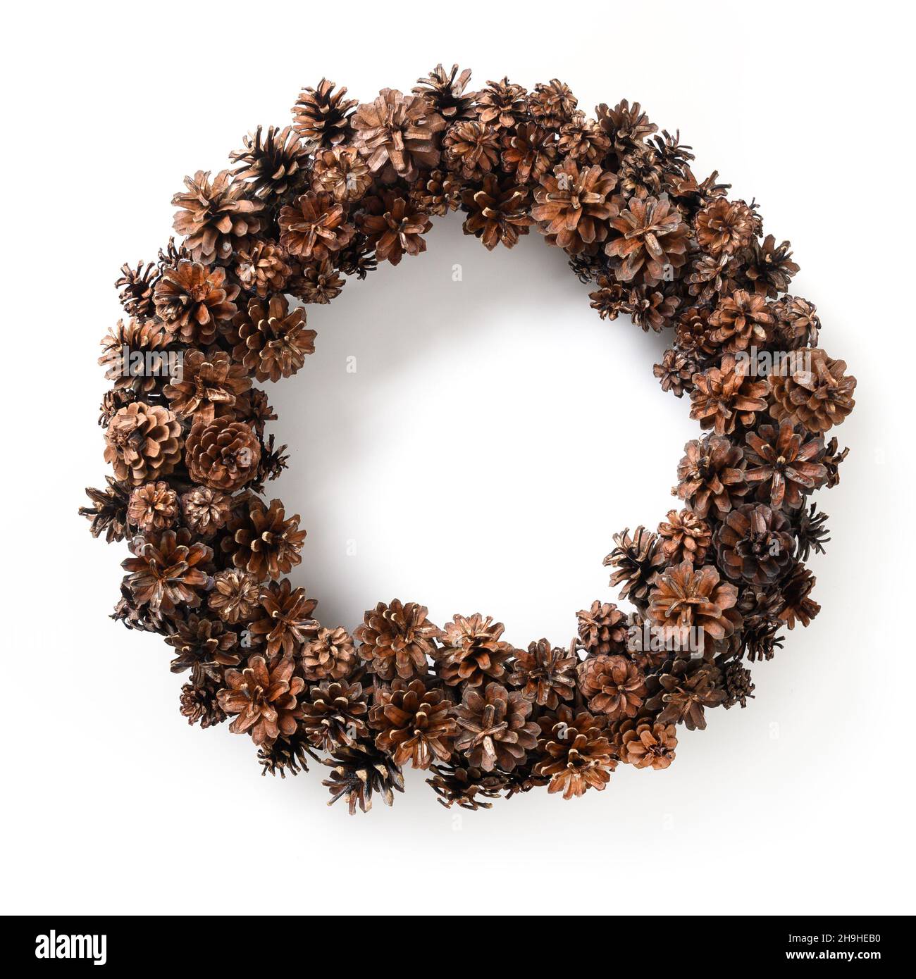 Christmas wreath of natural pine cones isolated on white background ...