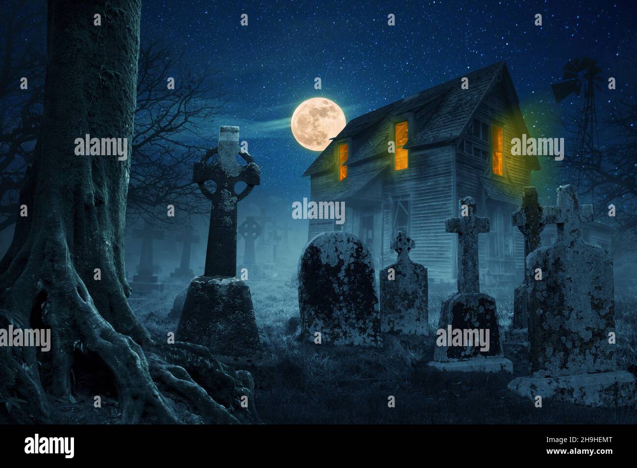 Scary house in the forest near the cemetery at night with a full moon and stars. Halloween idea concept Stock Photo