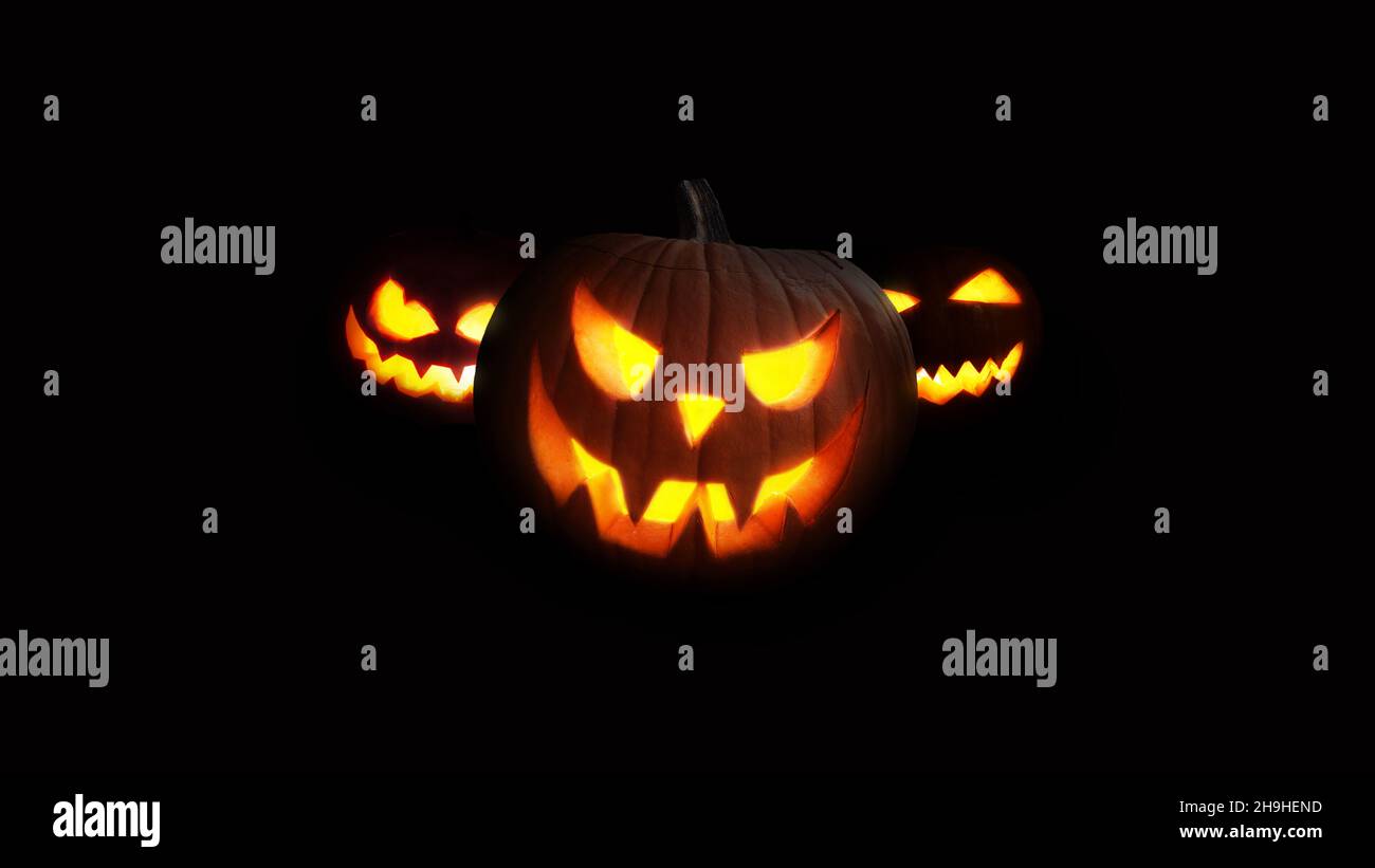Scary Pumpkins glow at night. Halloween picture on a black background ...