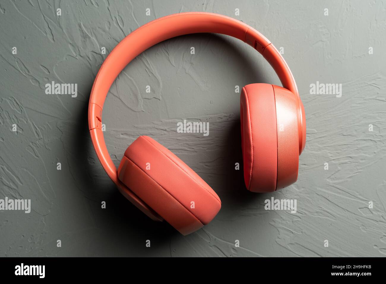 a red headphone on gray background Stock Photo