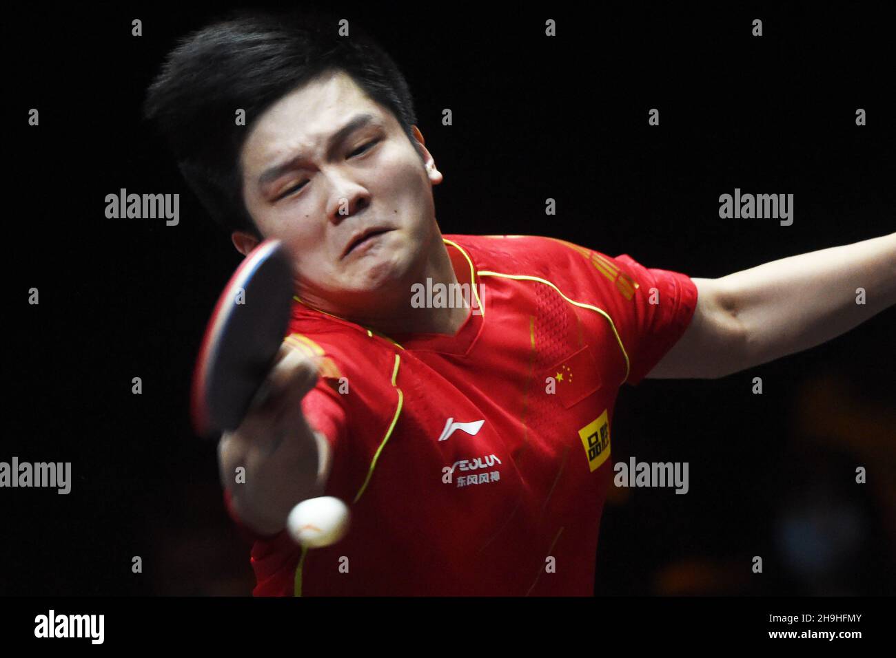 Singapore. 7th Dec, 2021. Fan Zhendong competes during the men's
