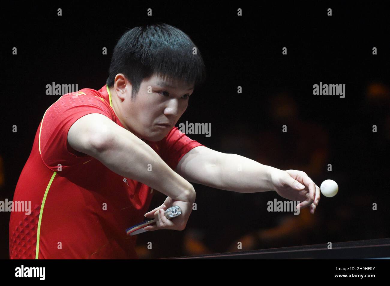 Singapore. 7th Dec, 2021. Fan Zhendong competes during the men's