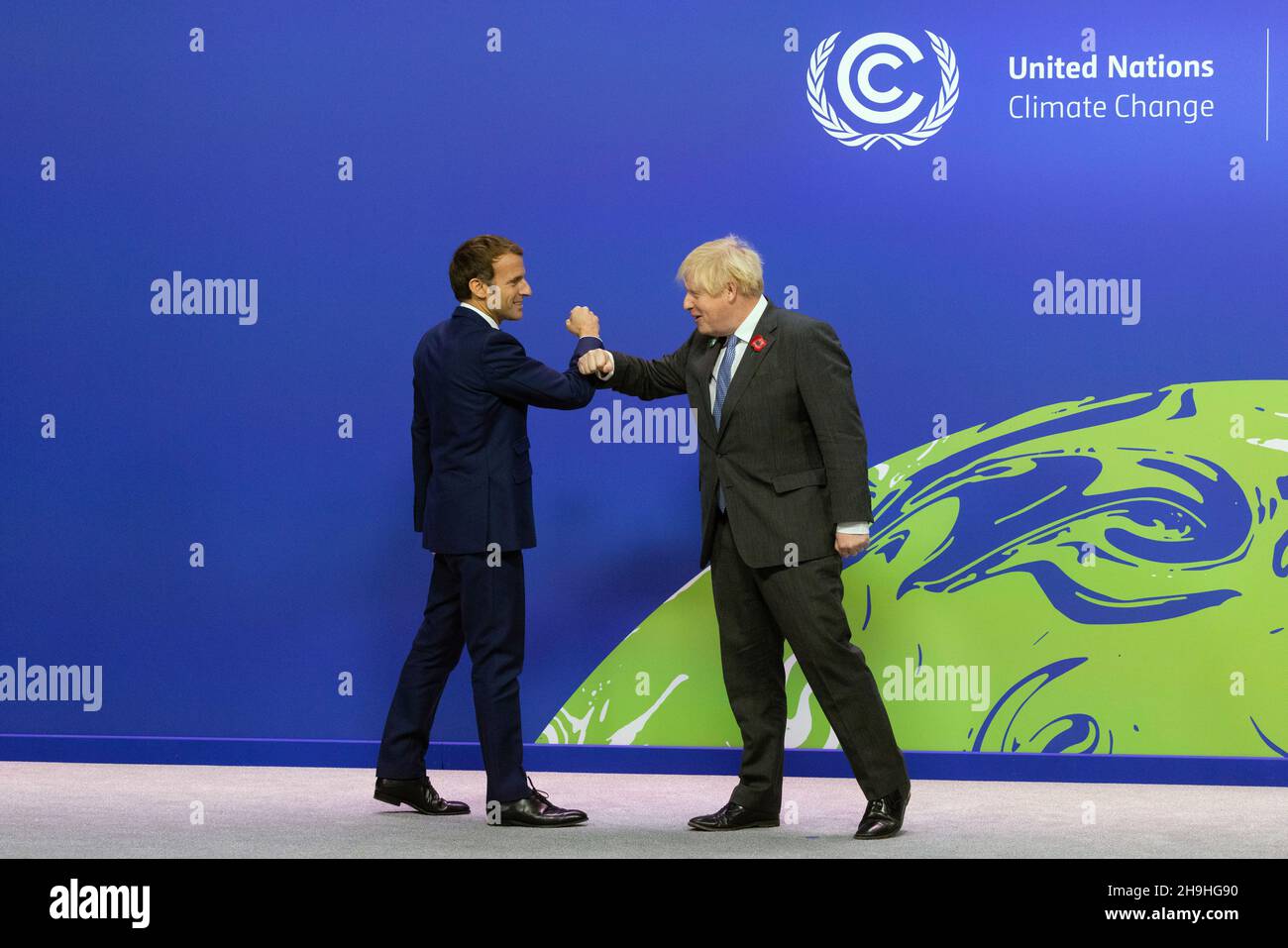 GLASGOW, SCOTLAND, UK - 01 November 2021 - British Prime Minister Boris Johnson welcomes French President Emmanuel Macron to the UN COP26 summit - Pho Stock Photo