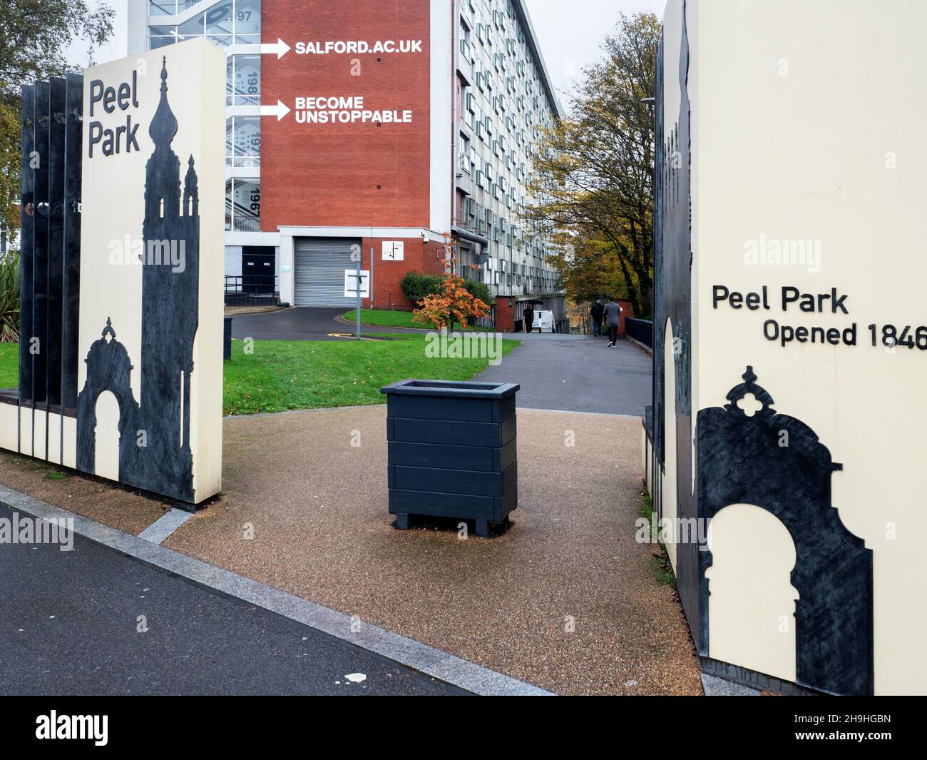Peel Park entrance and University of Salford Maxwell Building City of Salford Greater Manchester England Stock Photo