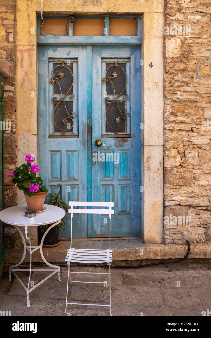 Old Greek house with blue door on Symi island in Greece Stock Photo - Alamy
