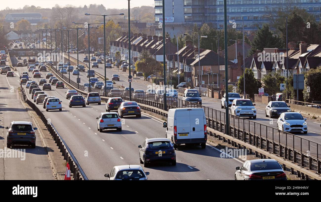 Traffic traveling on the A3 Bypass towards Tolworth South West London on a bright and dry late winters afternoon. Stock Photo