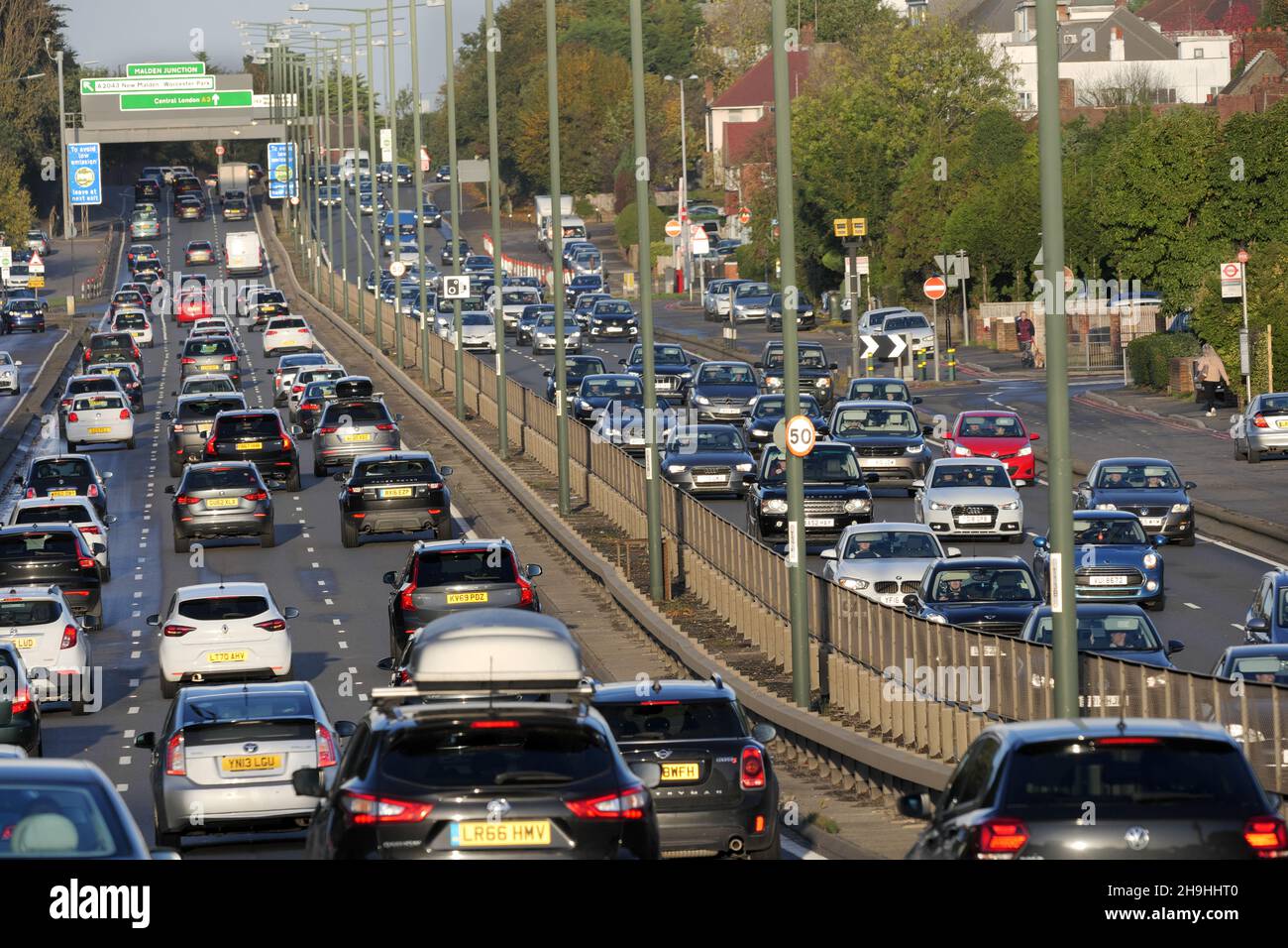 Heavy traffic on a busy stretch of the A3 Trunk Road in South West London on a bright winters afternoon. Stock Photo
