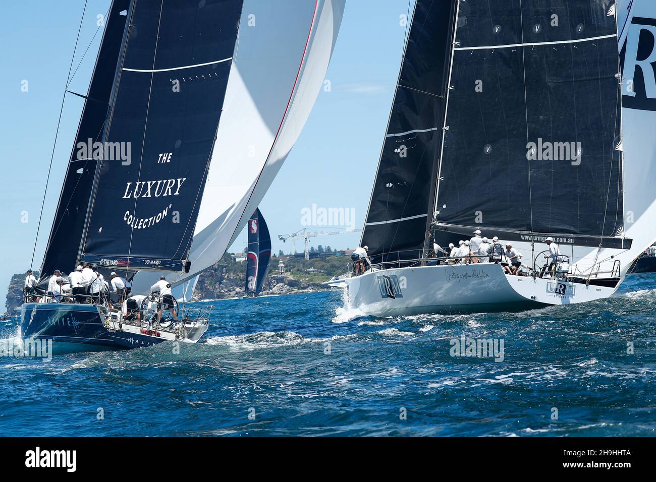 Sydney, Australia. 7th December 2021; Cruising Yacht Club of Australia, Sydney, NSW, Australia: SOLAS Big Boat Challenge; mini max yachts Alive and URM race side by side towards the finish line Credit: Action Plus Sports Images/Alamy Live News Stock Photo