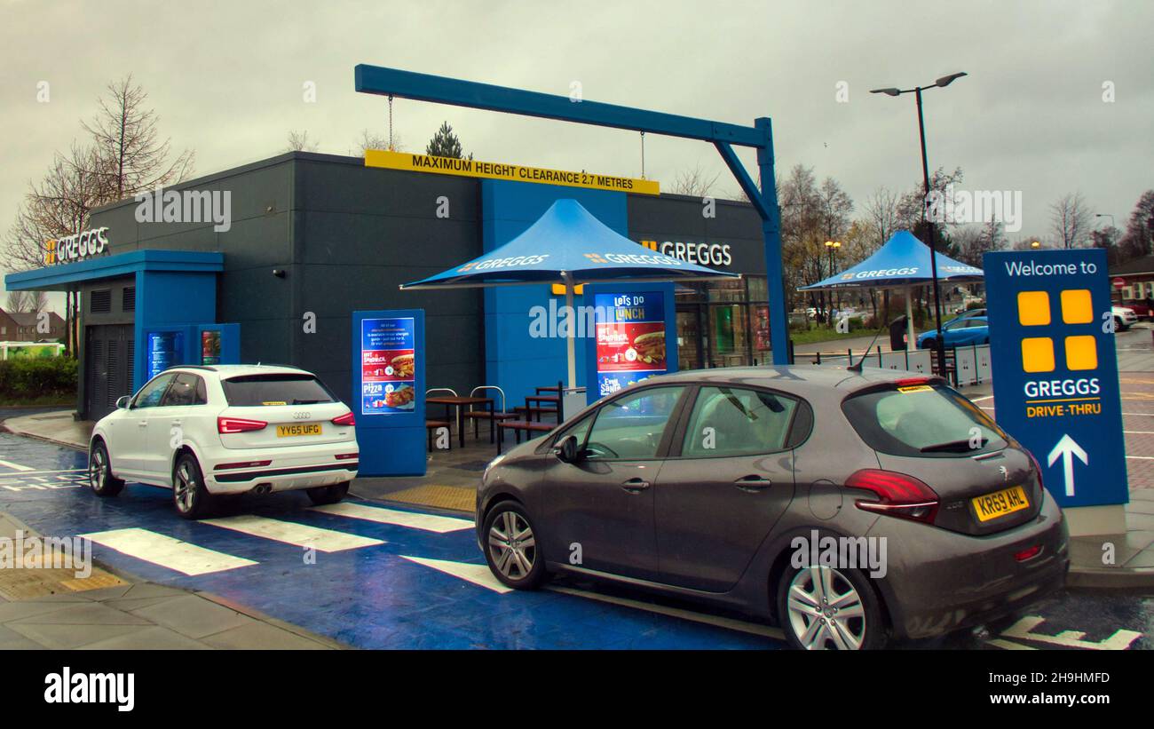 Glasgow, Scotland, UK  7th  December, 2021.  First greggs drive thru opens in great western retail park today with its target market of the council estate of drumchapel as its base.. Credit  Gerard Ferry/Alamy Live News Stock Photo