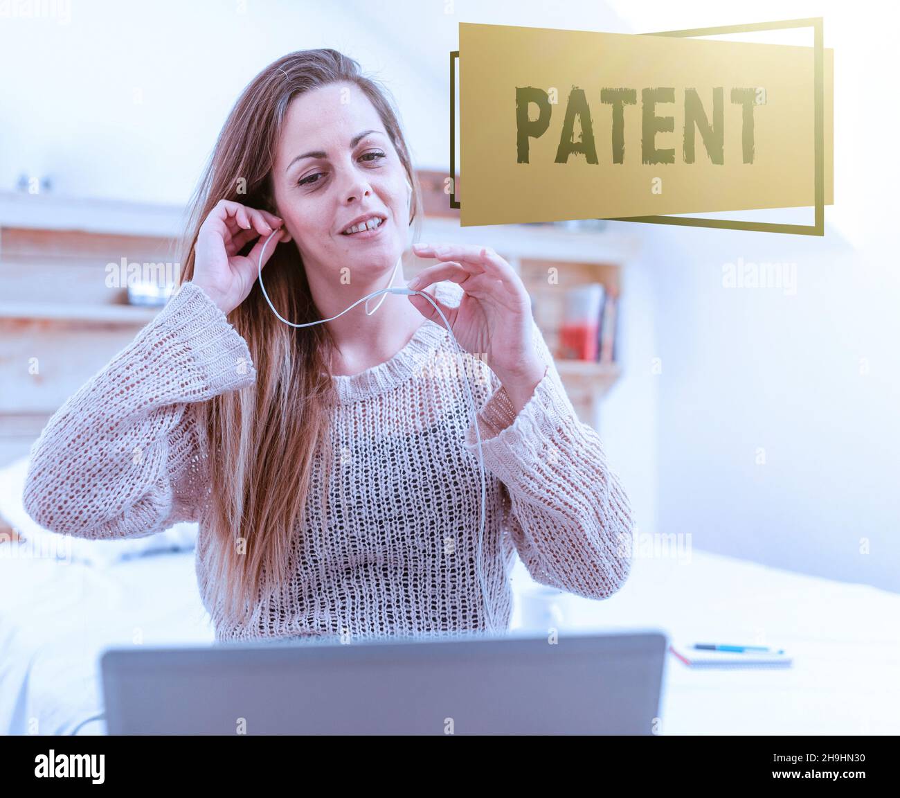 Text showing inspiration Patent. Business concept government authority or licence conferring a right or title Woman vediocalling through laptop from Stock Photo