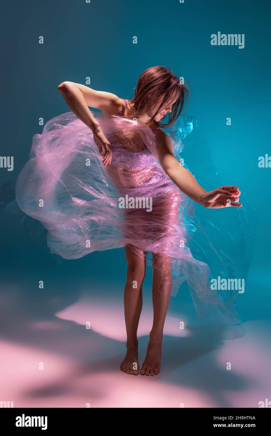 Solo performance. Beautiful flexible contemp dancer dancing with fabric ...