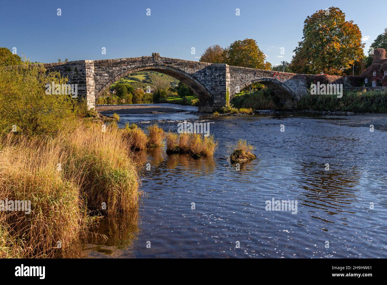 Historic bridge of the river Conwy at Llanrwst, North Wales Stock Photo