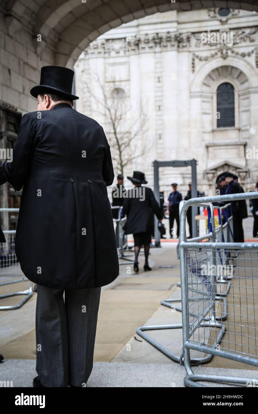 Guests go through security in Paternoster Square before Baroness Margaret Thatcher's Funeral in central London Stock Photo