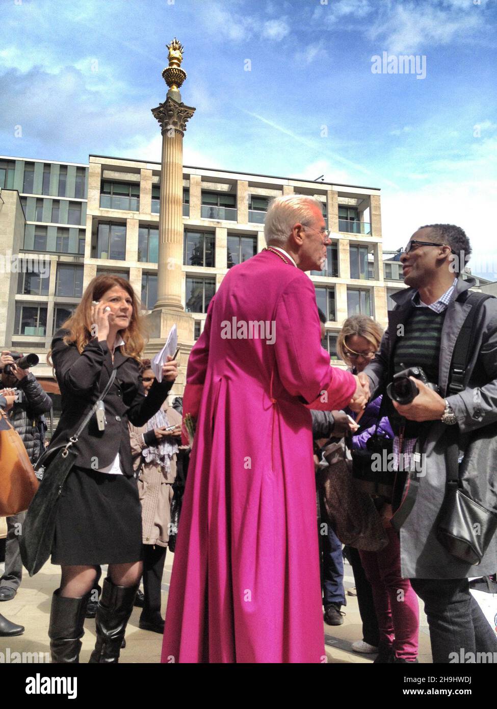 Bishop Michael John Colclough, the Canon Pastor of St Paul's Cathedral being interviewed after the funeral of Baroness Thatcher. Picture taken and edited on the iPhone camera with Snapseed Stock Photo