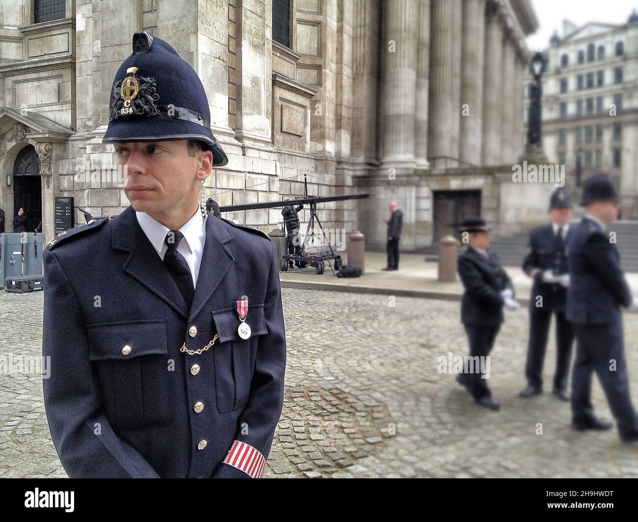 Police outside St Paul's Cathedral at Baroness Margaret Thatcher's Funeral. Picture taken and edited on the iPhone camera with Snapseed Stock Photo