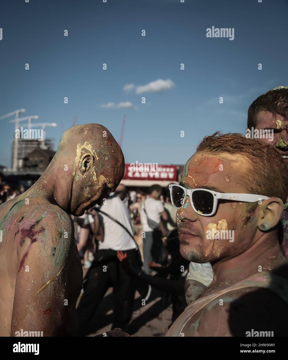 Party goers at the holi festival of colours in london held near