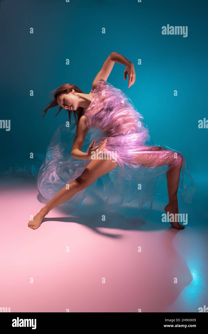 Solo performance. Beautiful flexible contemp dancer dancing with fabric ...