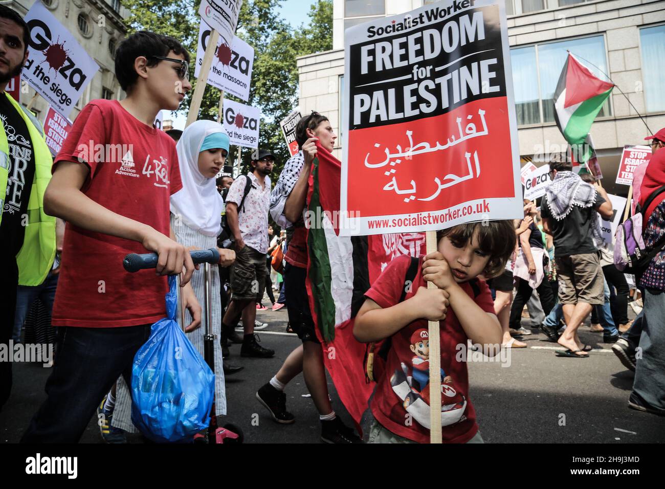 Protesters on a march in support of Palestine from the Israeli embassy