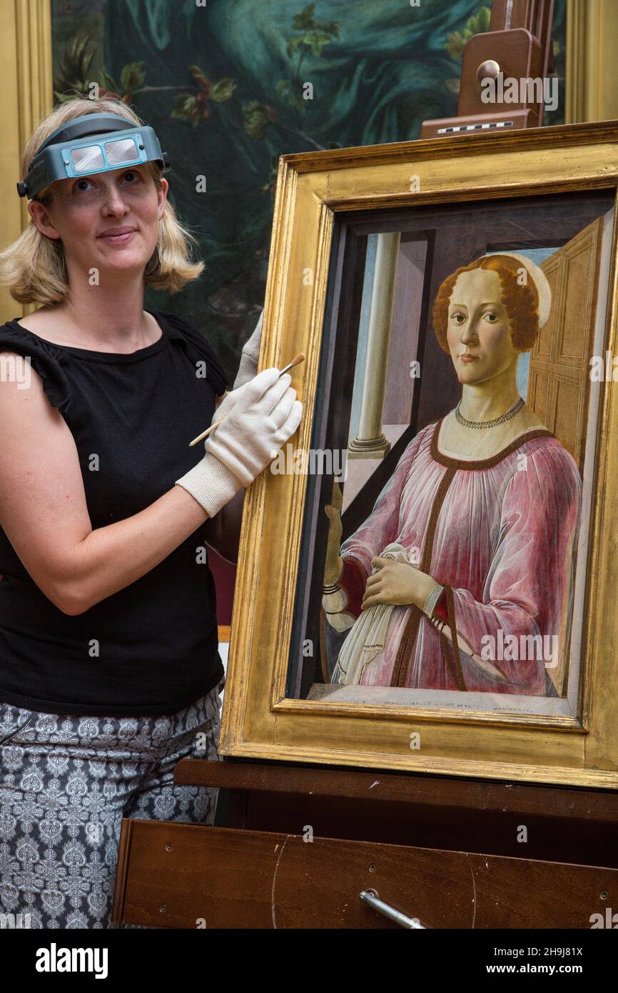 Sandro Botticelli's Portrait of a Lady known as Smeralda Bandinelli (c.1470-5) following a major scientific investigation and restoration project. The painting will be the centre-piece of a new exhibition, Botticelli Reimagined, at the Victoria and Albert Museum in London and is presented here by conservator, Clare Richardson Stock Photo