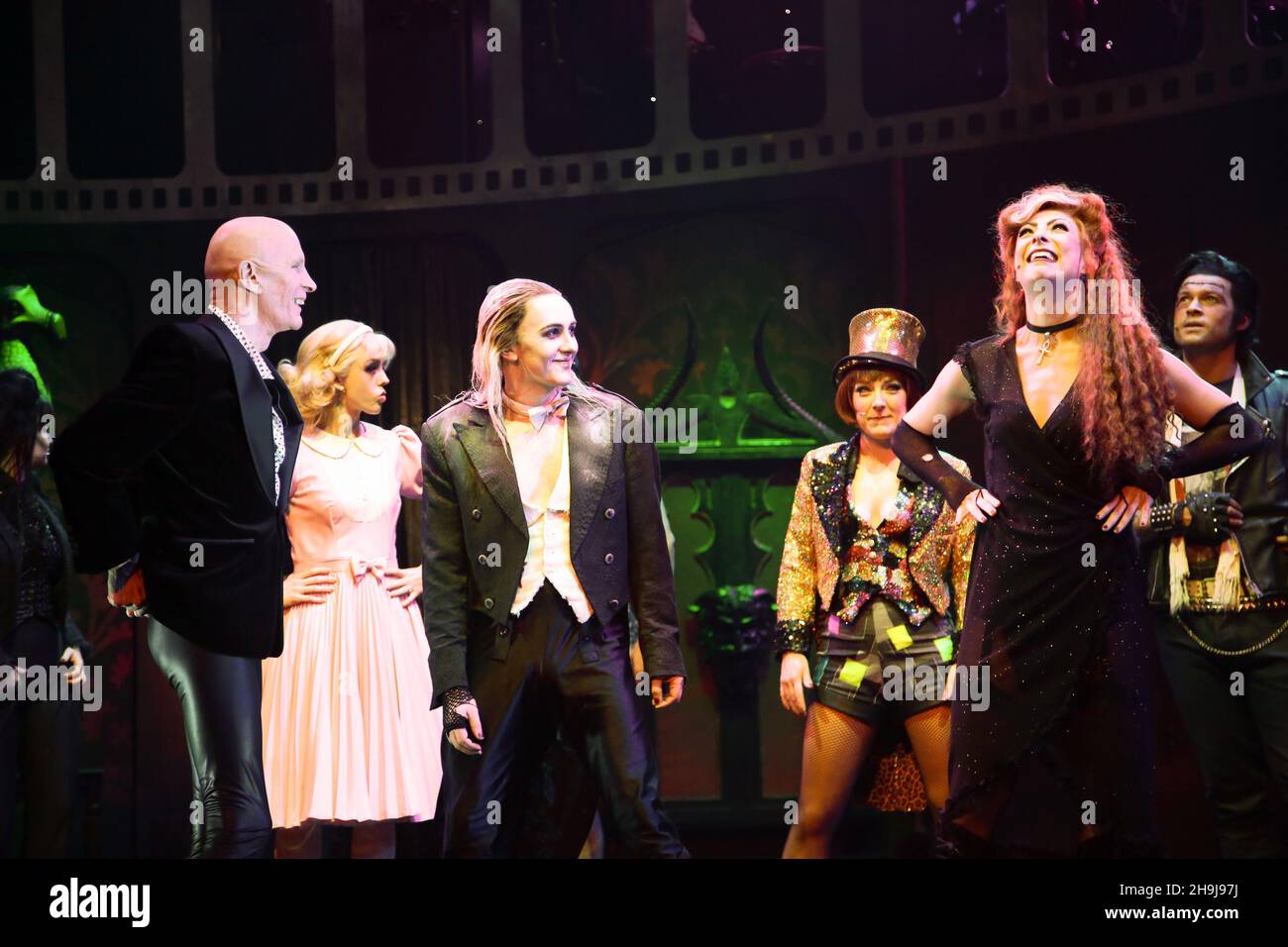 The cast of the Rocky Horror Show performing on stage at a press call